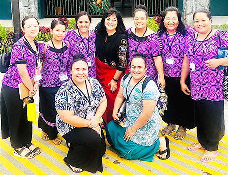 Nancy Morgan, RN, surrounded by students of the ASCC Nursing Program