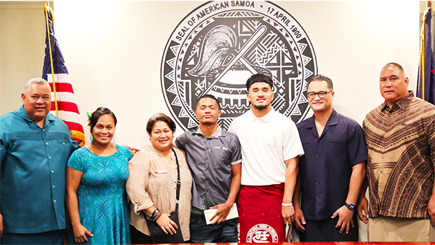 Gov and Lt Gov with student athletes and their families