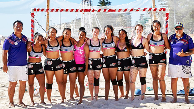American Samoa's women’s beach handball team with their coaches