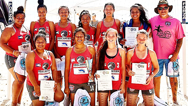 The nine-member Women's Under-18 Handball American Samoa team that will be competing in the 2018 Youth Olympics in October, in Buenos Aires, Argentina. The team is pictured with the American Samoa Handball Association president and coach, Carl Sagapolutele Floor Sr. (far right) at their new handball field next to Night Hawk Maliu Mai Resort.[photo: Leua Aiono Frost]