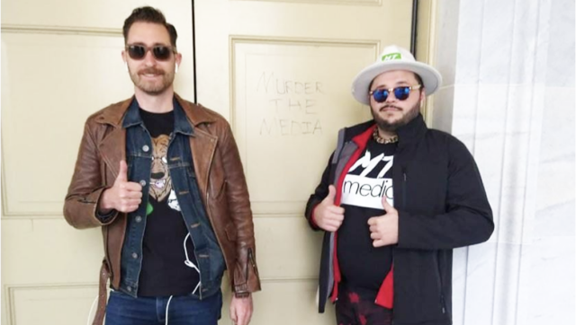 Proud Boys Nick Ochs, left, and Nicholas DeCarlo pose