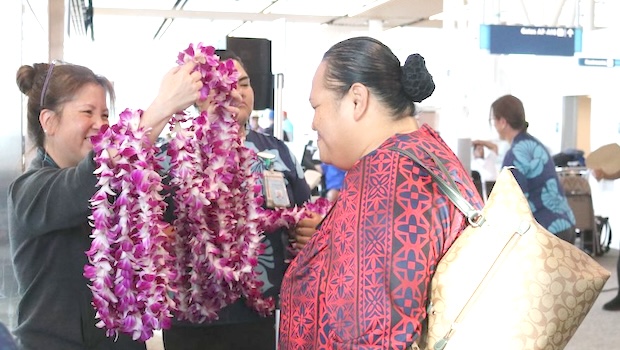 Hawaiian Air employees gave travelers on a recent flight to Pago a flower ula