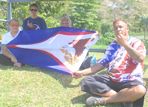 Supporters with Am Samoa flag