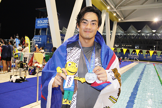 Micah with medal