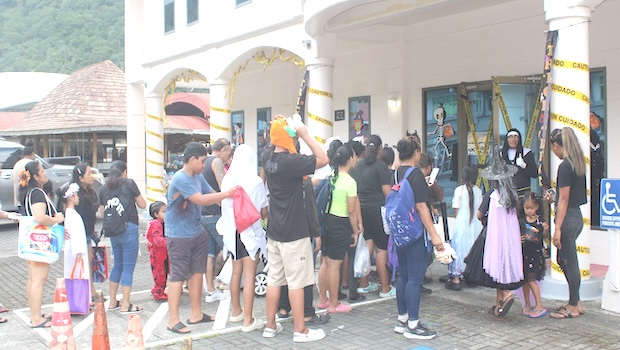 Halloween tricksters lined up outside the Jean P. Haydon Museum 