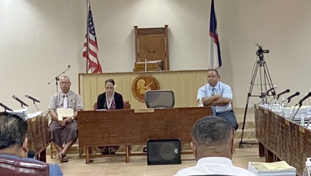 Malemo Tausaga (left) and Deputy Attorney General Roy Hall 