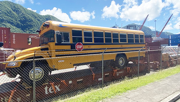new school bus on trailer