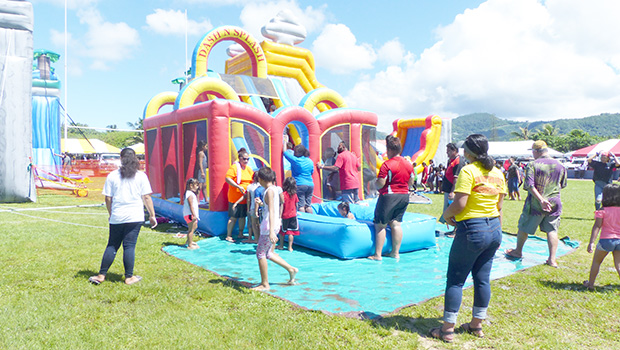 Kids enjoying jumpers at Farm Fair