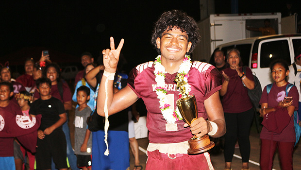 Metuliki Tupou flashing a V for victory