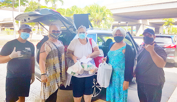 People providing food for veterans