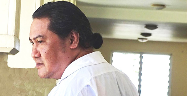 Kolani Junior Lam outside the courthouse in Samoa.