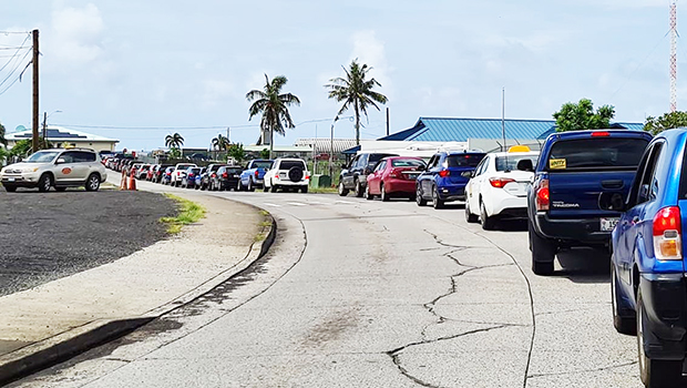 Vehicles lined up at Drive thru vax site