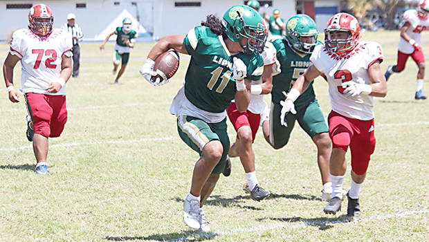 Alex Faiivae (11) of the Leone Lions returning this punt all the way to the end zone
