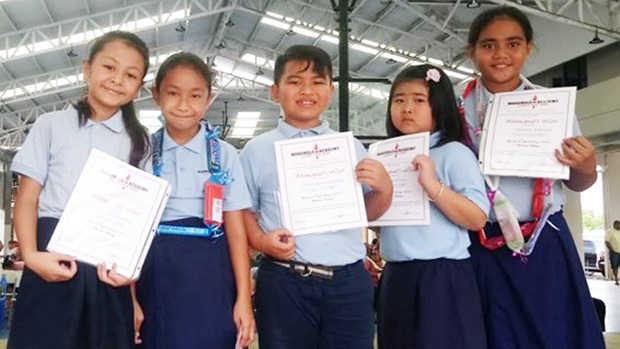 A group of bright third graders at Manumalo Academy