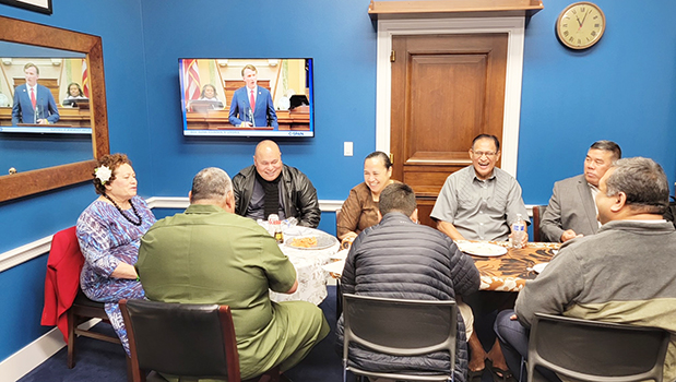 Governor's traveling group at lunch with Amata