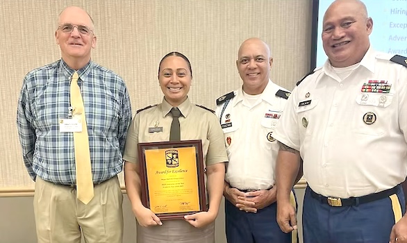 Major Siimoa Malaefono Galoia (2nd left) and Mark Allen Pratt (far left), 