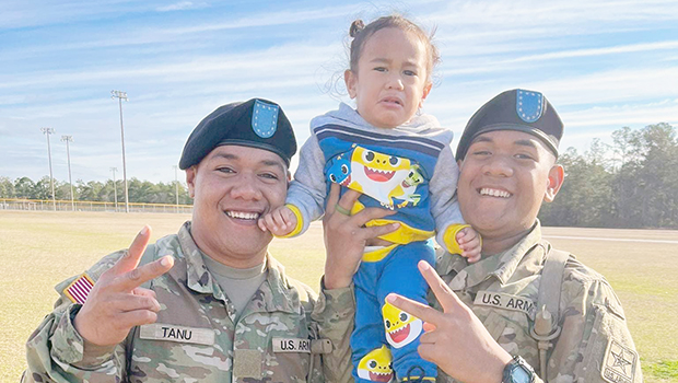 PVT Fa’amagalo Tanu and PVT Sene Jr Isileli with their nephew Jelsen