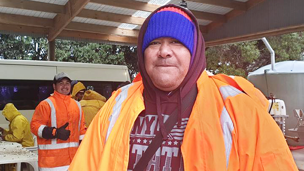 Samoan man in many layers of clothing because of the cold NZ winter.