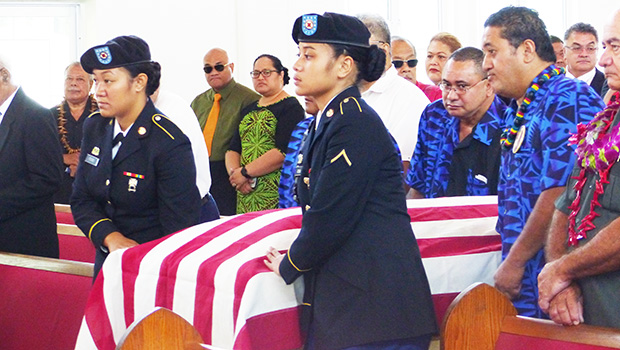 Former Rep. Matagi's flag drapped casket being carried into funeral service