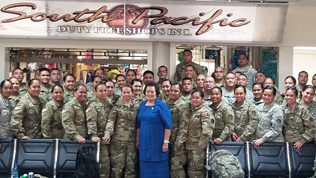 Amata with troops at airport