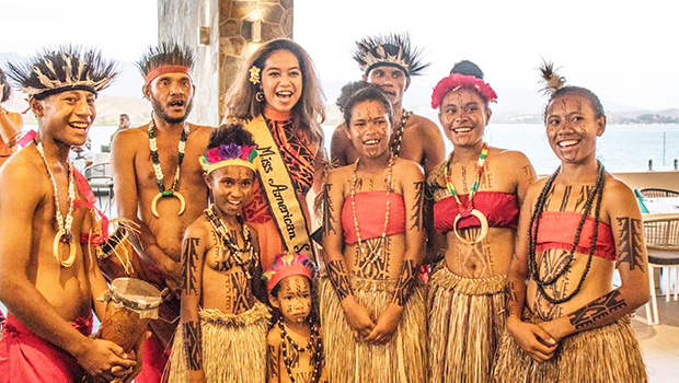 Miss American Samoa with young entertainers in PNG
