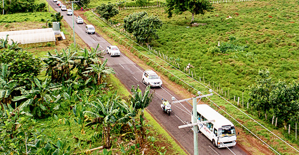 The Samoa police motorcade during the relocation of the prisoners to the new prison