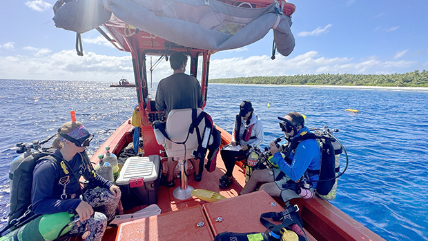NOAA Ship Rainier crew in dingy prpeparing to dive