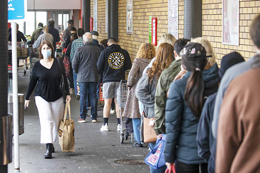 Shoppers lineup in Auckland at beginning of lockdown