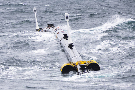 Photo of Ocean Cleaning Machine on the water.