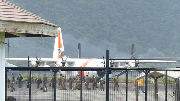 People deplaning uscg plane