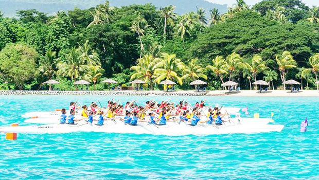 An action shot of va'a teams lining up at the Pacific Games event