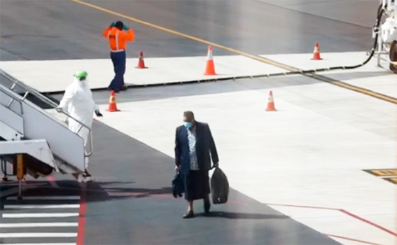 Passenger getting off Air New Zealand plane