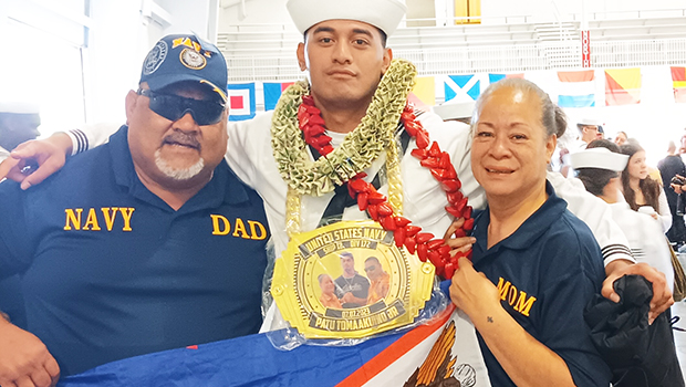 Seaman Patu with his parents
