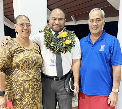 Talisau Lincoln Moliga with his parents