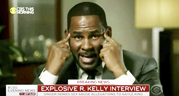 In this frame from video provided by CBS, R. Kelly talks during an interview 