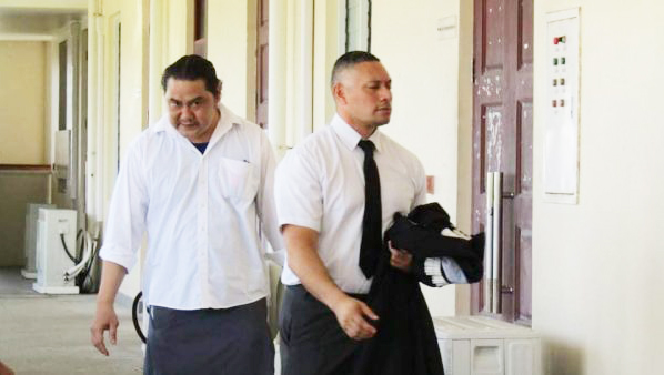 Kolani Junior Lam with his attorne