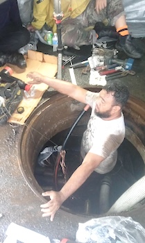 ASPA employee completing the repairs
