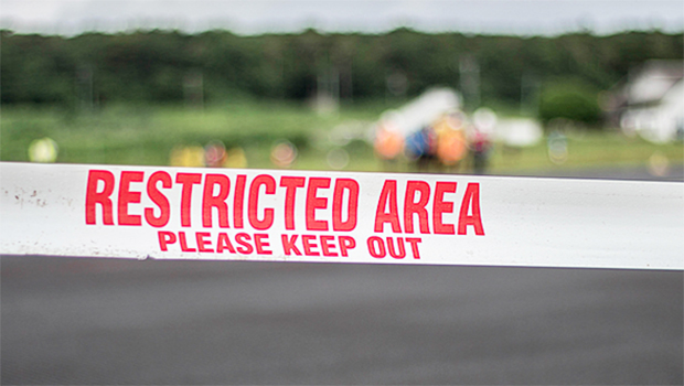 Police tape sealing off the area at the Mulifanua wharf,