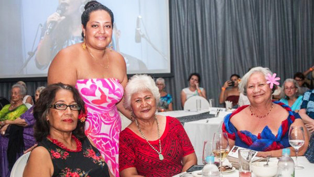 Renata Rivers in pink together with family and friends