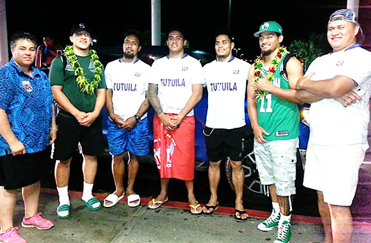 Talavalu players, with head coach Tommy Elisara (far right) and team manager Annie Coffin (far left).
