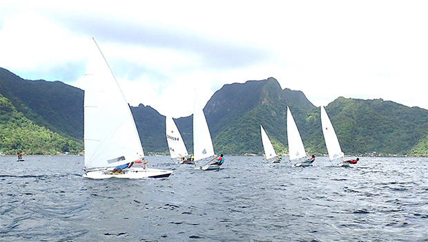 Sailboats sailing in Pago Harbor