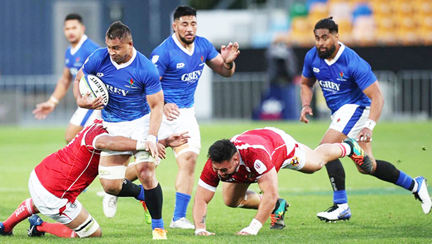 Center Henry Taefu scores a try