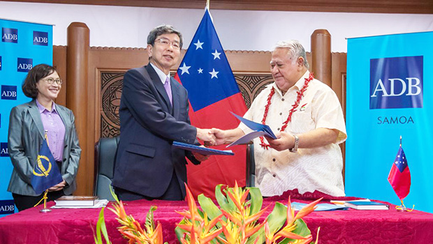 ADB President Mr. Takehiko Nakao (middle) with Samoa Prime Minister Tuilaepa Lupesoliai Sailele Malielegaoi (right) and ADB Director General for the Pacific Ms. Carmela Locsin (left) 