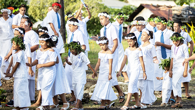 Children parading to White Sunday celebration in Samoa