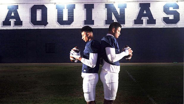 Aquinas High School football players Francisco Mauigoa, 16, (L), and Francis Mauigoa, 14, (R)