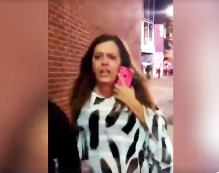 Woman racially harrassing two men