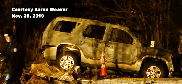 The burned out car where the bodies were found. 