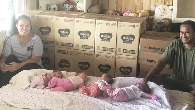 Mrs. Filomena Sokimi (far left) and Sokimi Sokimi Jr. (far right) of Ili’ili with the four baby girls