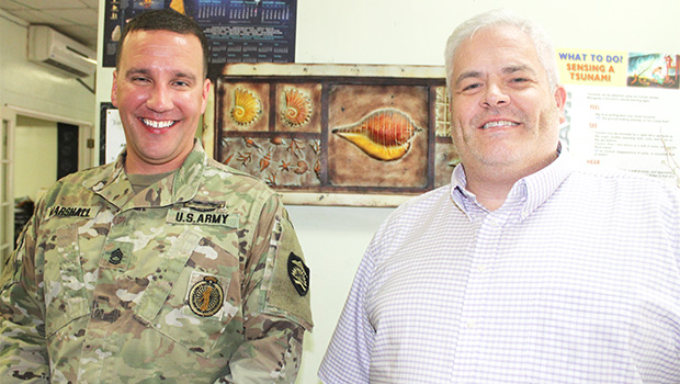 Neil Woolf (right) with Sgt. First Class Nick Marshall