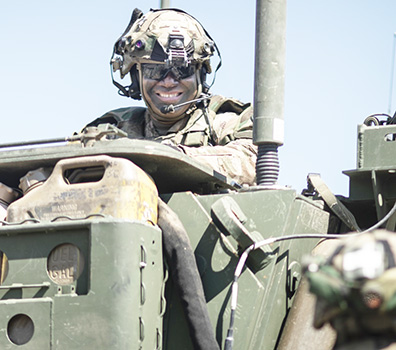 Staff Sgt. Sapa Taala on a tank.